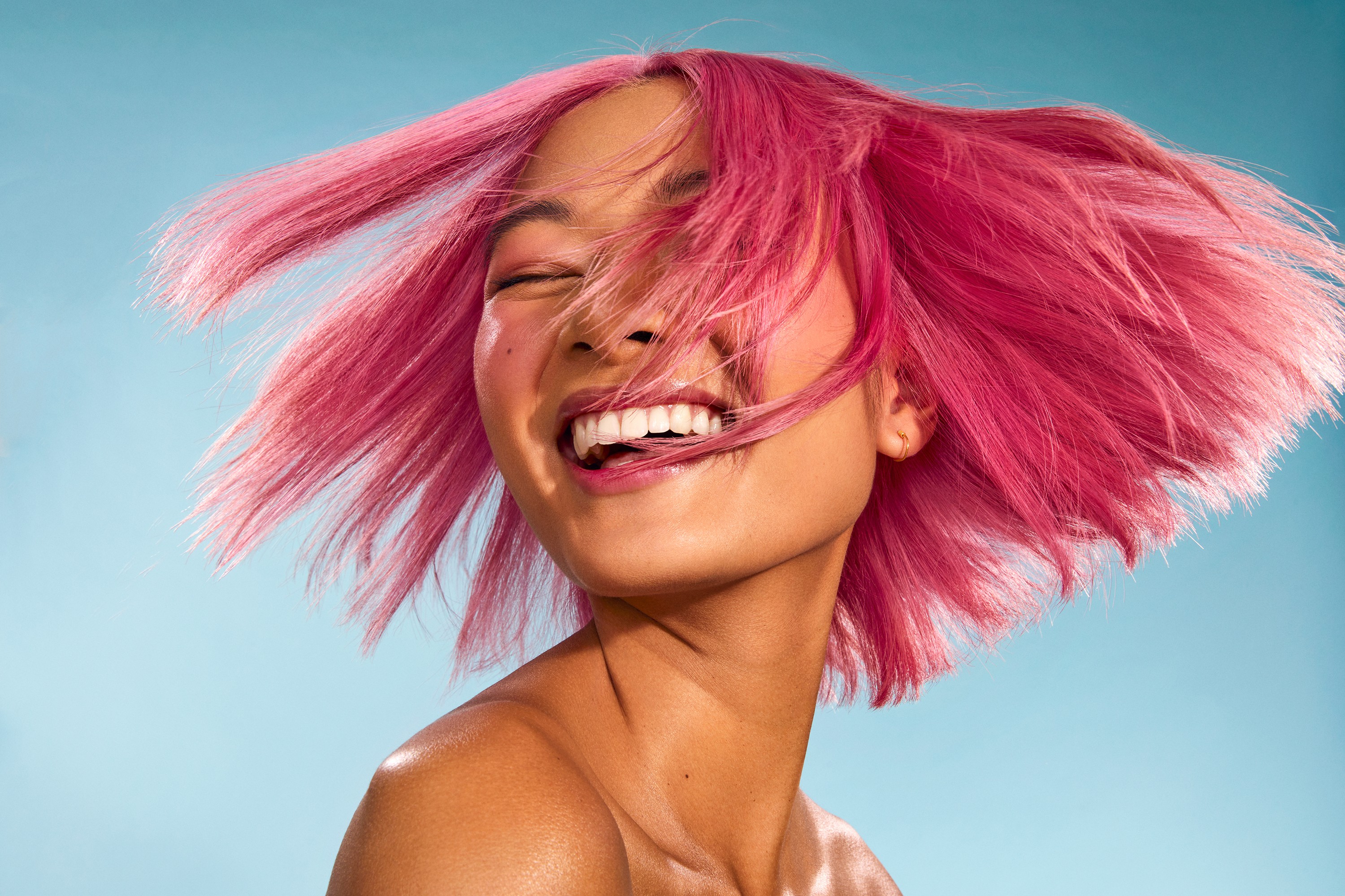 Anders brand wordmark in white placed on top of an image of a modern interior design.